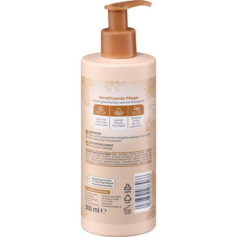 Balea Bodylotion Comfort 300 ml in einer beigen Flasche mit braunem Pumpspender und detaillierten Produktinformationen.