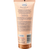 Rückseite der Balea Bodylotion Pumpkin Spice Tube, 200 ml, mit Produktinformationen, Inhaltsstoffen und Barcode auf pfirsichfarbenem Grund.