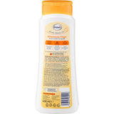 Weiße Balea Q10 straffende Bodylotion Flasche mit orangefarbenem Deckel und 400 ml Inhalt auf weißem Hintergrund.