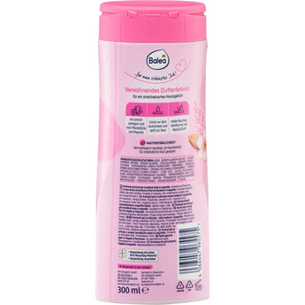 Rückseite der 300 ml Balea Cremedusche Mandelblüte & Magnolie mit Inhaltsstoffen, Anwendungshinweisen und rosa Design.
