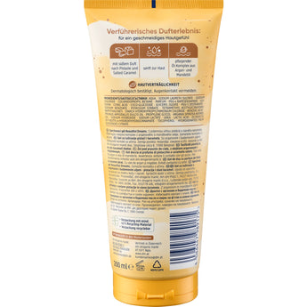 Rückseite der Balea Beautiful Dreams Duschgel Tube (200 ml) mit Inhaltsstoffen und Produktinformationen auf beigem Hintergrund.