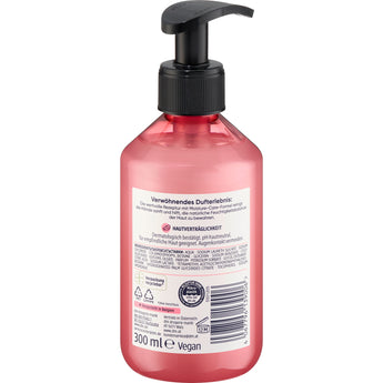 Rückseite einer rosafarbenen Balea Flüssigseife Peony & Sandalwood 300 ml mit schwarzem Pumpspender und Produktinformationen.
