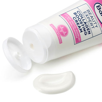 Balea Beauty Expert Collagen Boosting Creme in weißer 50ml Tube mit geöffnetem Deckel und einem Klecks weißer Creme.