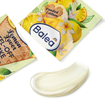 Balea Lemon Lover Peel-Off Maske mit Ananas-Zitronen-Design und einem Klecks schimmernder, perlmuttfarbener Gel-Textur.