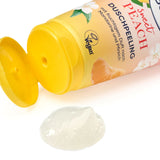 Gelbes Balea Duschpeeling Sweet Peach mit offener Tube und einem Klecks transparentem Peeling-Gel auf weißem Grund.
