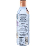 Hellblaue 250 ml LANGHAARMÄDCHEN Conditioner Flasche mit floralem Design, kupferfarbenem Deckel und detaillierten Produktinfos.