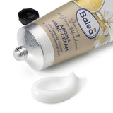 Balea Aroma Handcreme Ginseng & Green Mandarin in einer 75 ml Tube mit weißer Creme auf weißem Hintergrund.